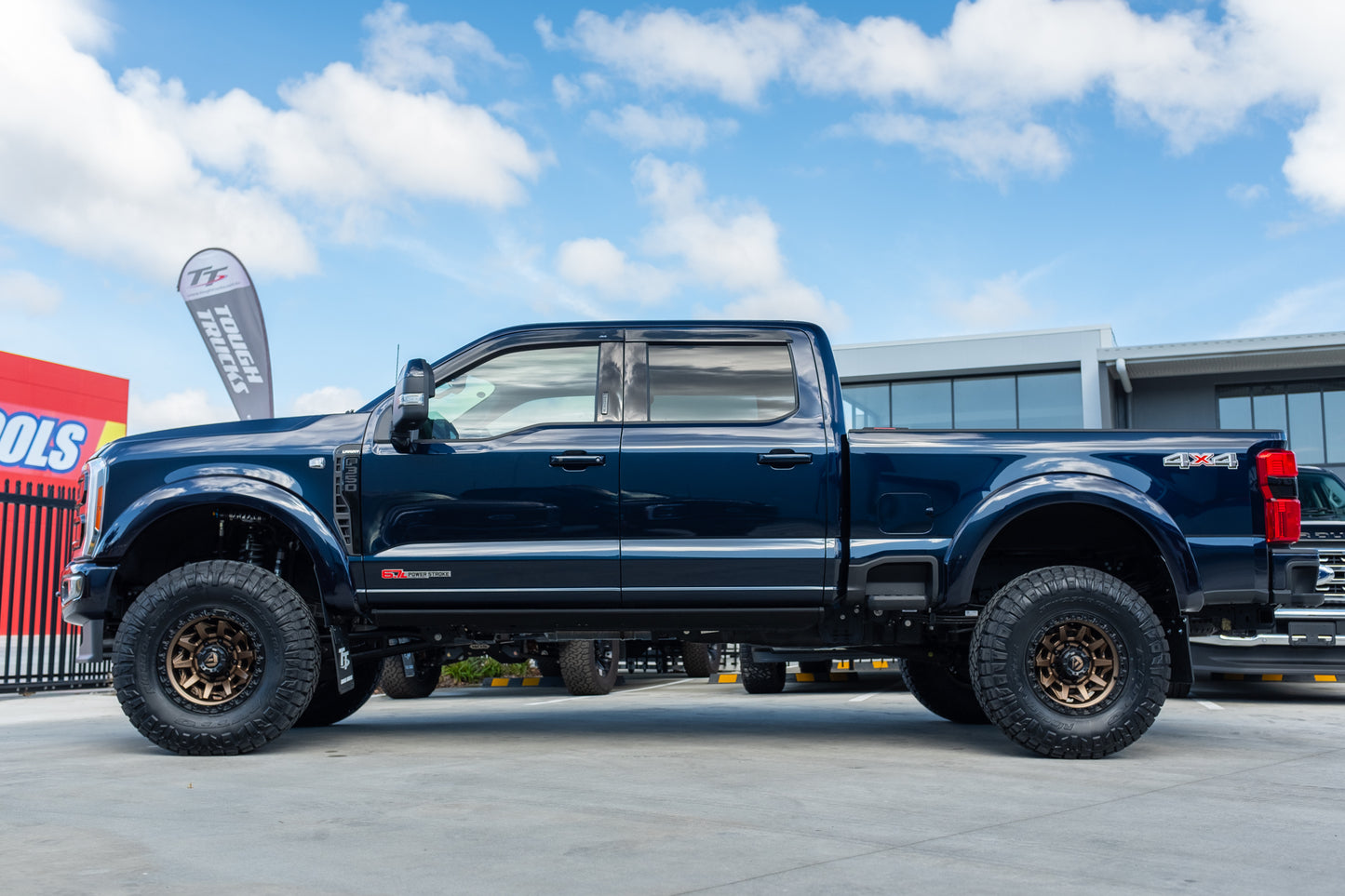 NEW 2023 FORD F350 LARIAT 'SHOP CUSTOM' - ANTIMATTER BLUE (STOCK # 5042)