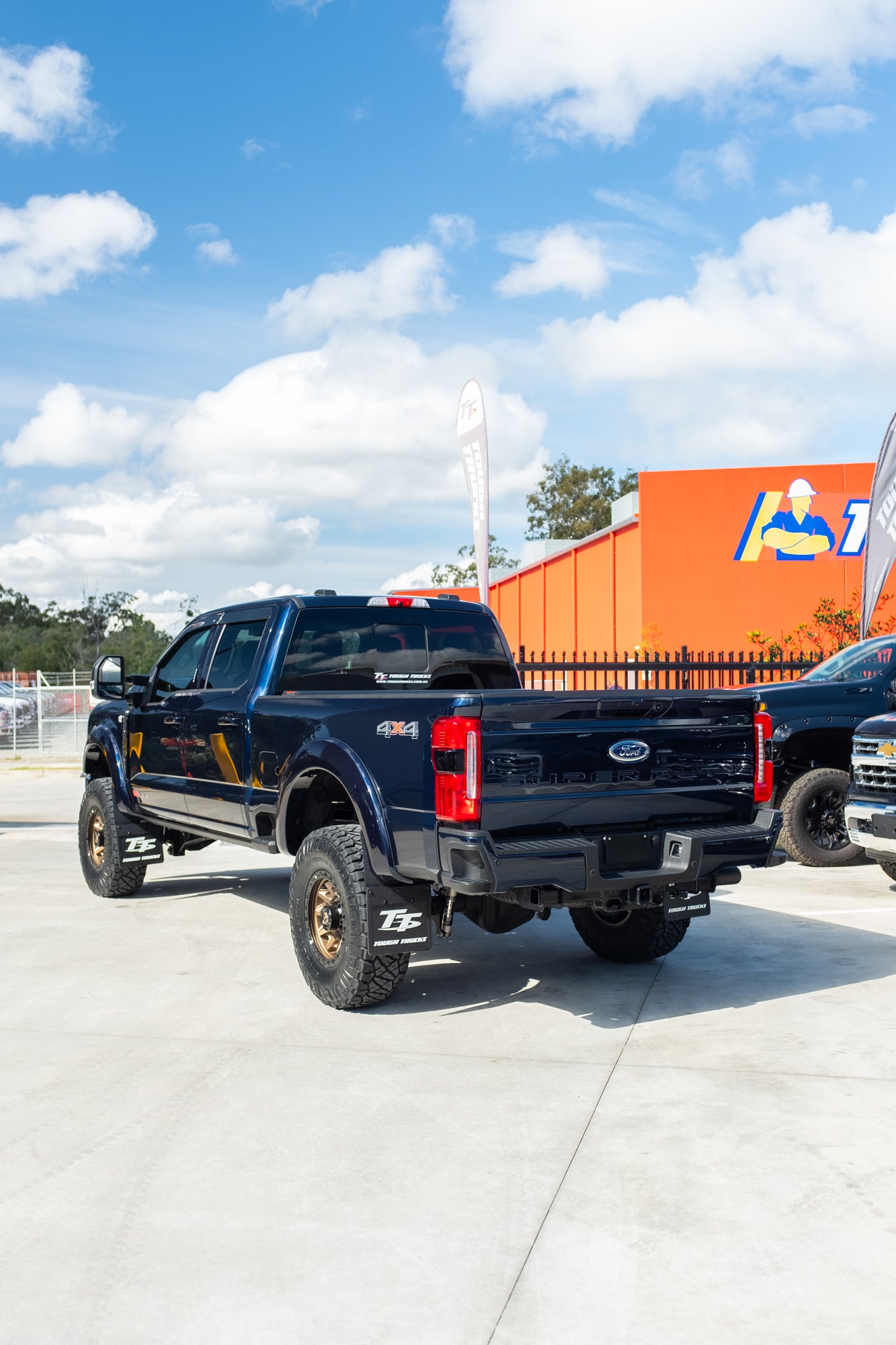 NEW 2023 FORD F350 LARIAT 'SHOP CUSTOM' - ANTIMATTER BLUE (STOCK # 5042)