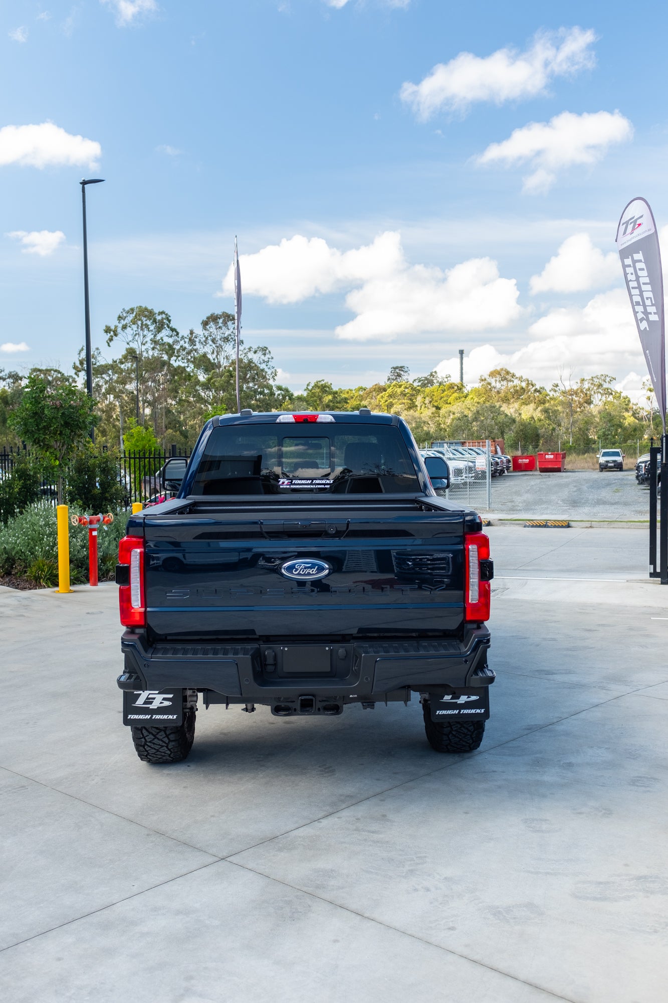 NEW 2023 FORD F350 LARIAT 'SHOP CUSTOM' - ANTIMATTER BLUE (STOCK # 5042)