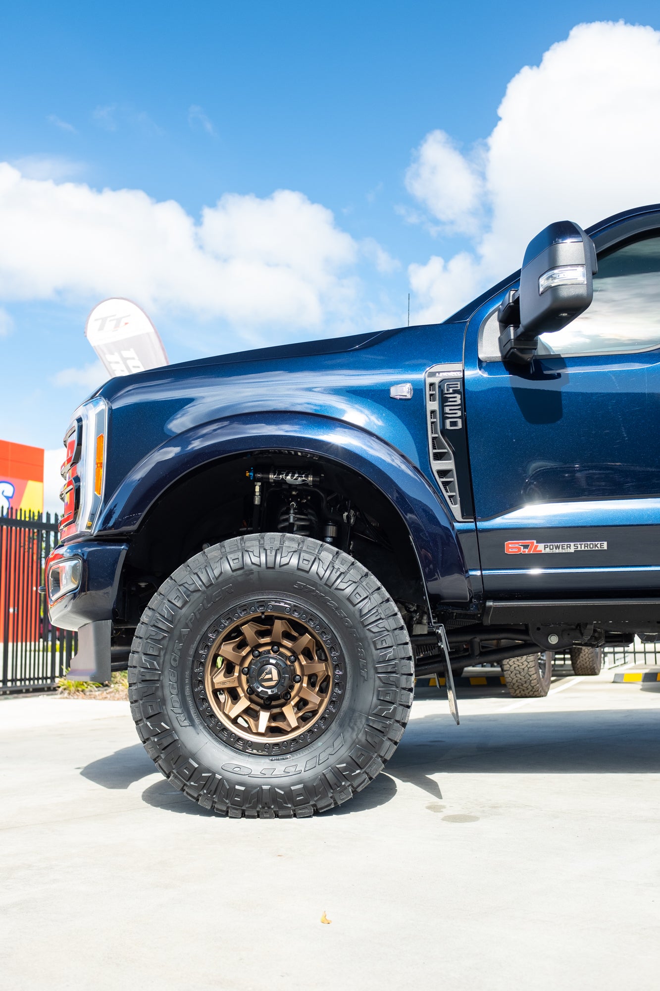 NEW 2023 FORD F350 LARIAT 'SHOP CUSTOM' - ANTIMATTER BLUE (STOCK # 5042)