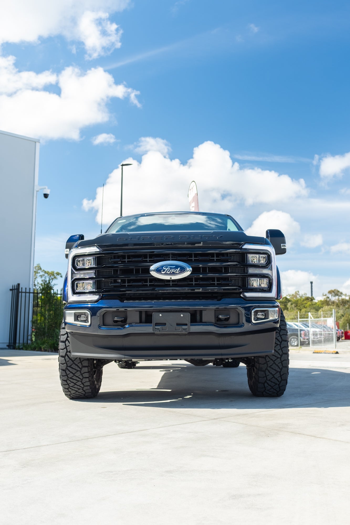 NEW 2023 FORD F350 LARIAT 'SHOP CUSTOM' - ANTIMATTER BLUE (STOCK # 5042)