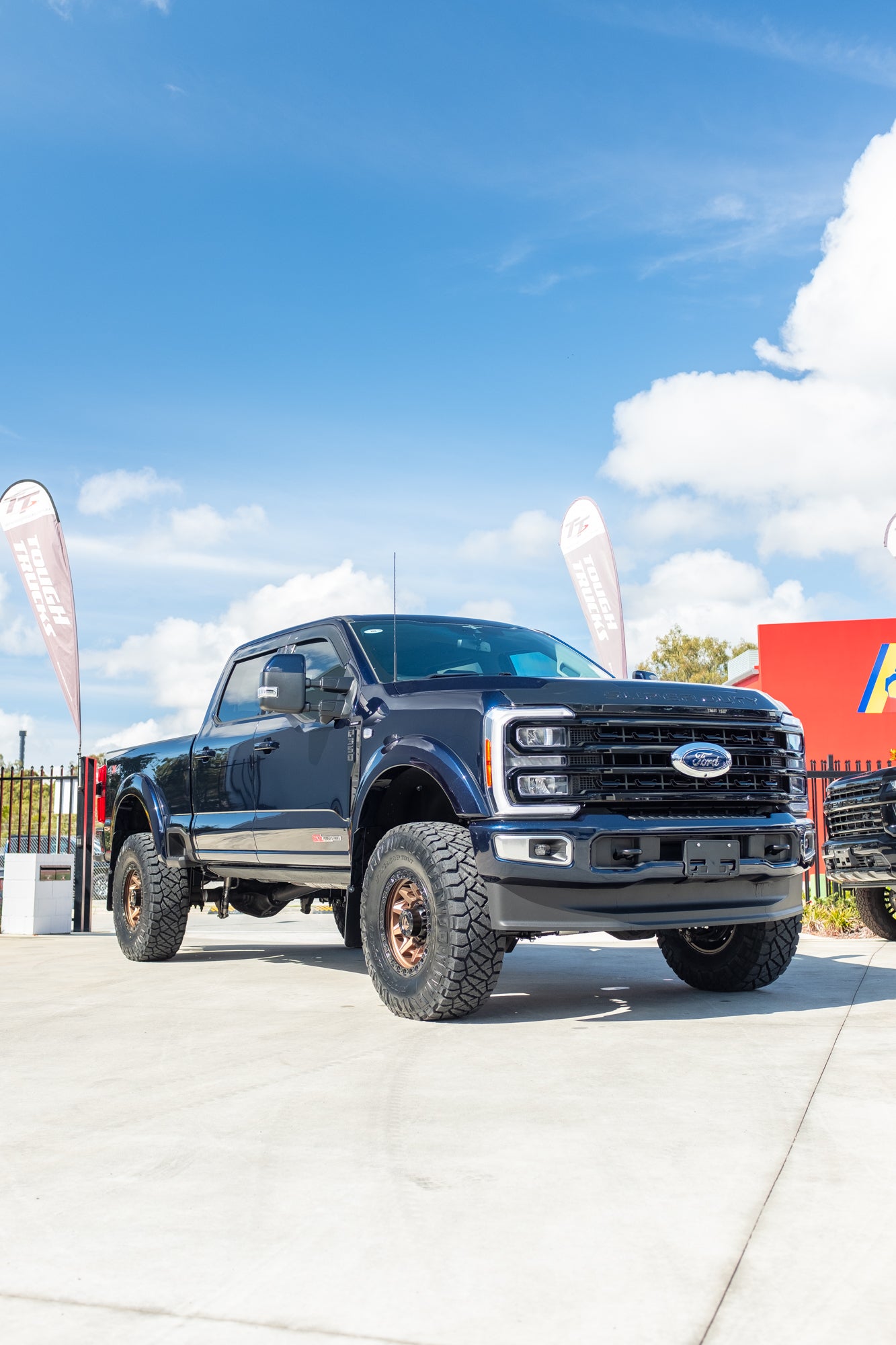 NEW 2023 FORD F350 LARIAT 'SHOP CUSTOM' - ANTIMATTER BLUE (STOCK # 5042)