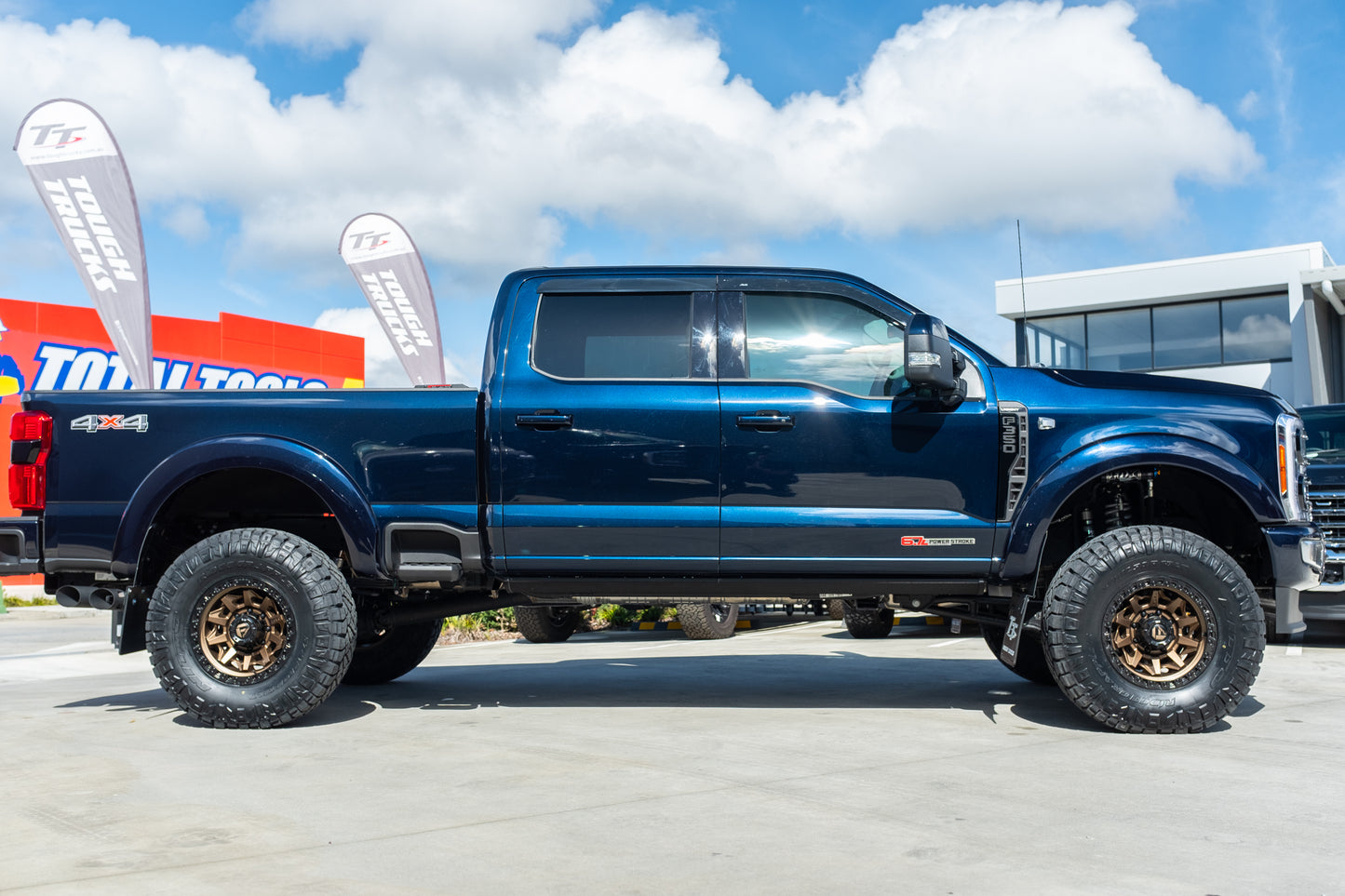 NEW 2023 FORD F350 LARIAT 'SHOP CUSTOM' - ANTIMATTER BLUE (STOCK # 5042)