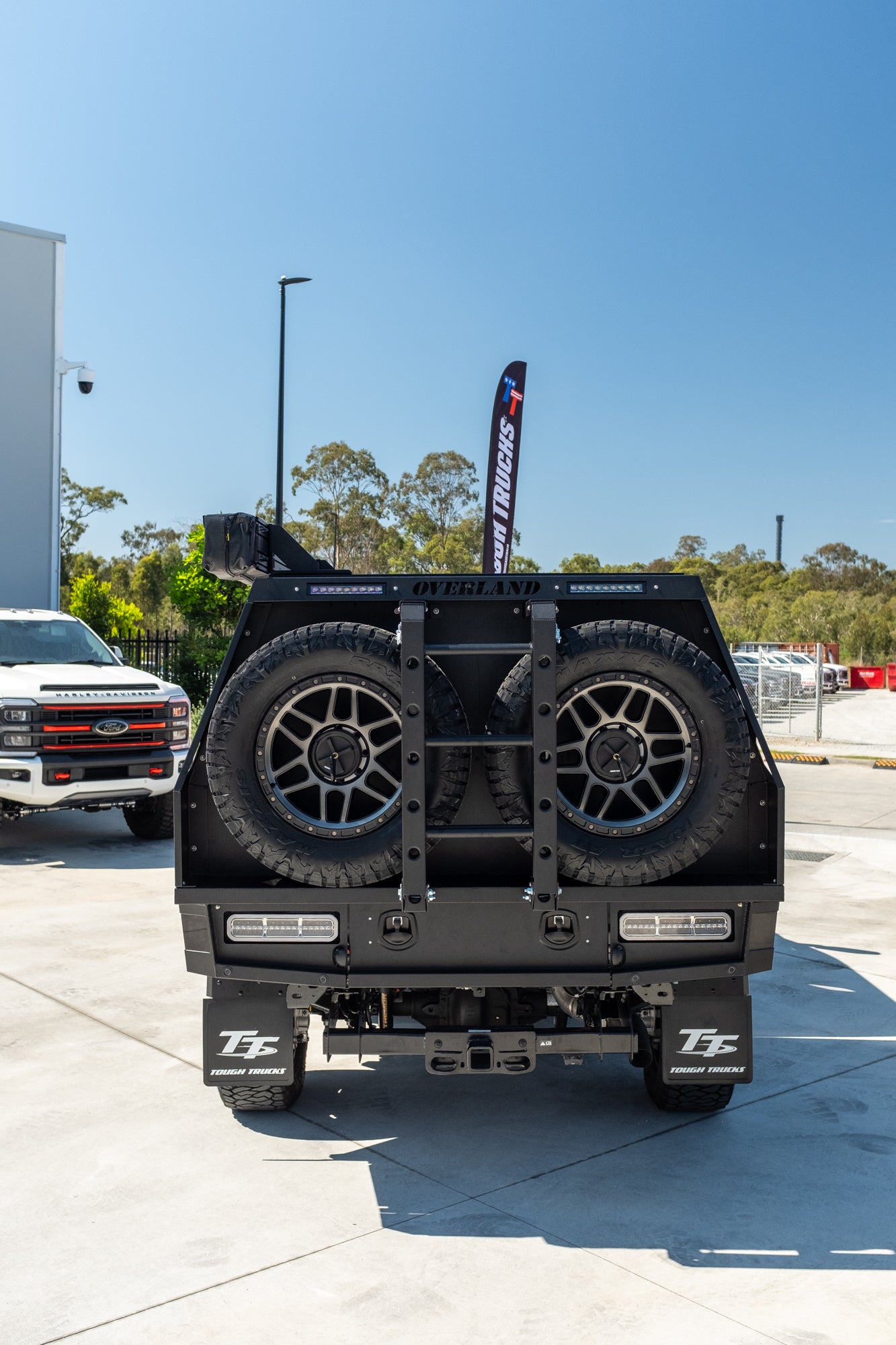 NEW 2023 F350 XLT TREMOR "OVERLAND PACKAGE" FACTORY 6-SEATER, CARBONIZED GREY (STOCK #TT0093).