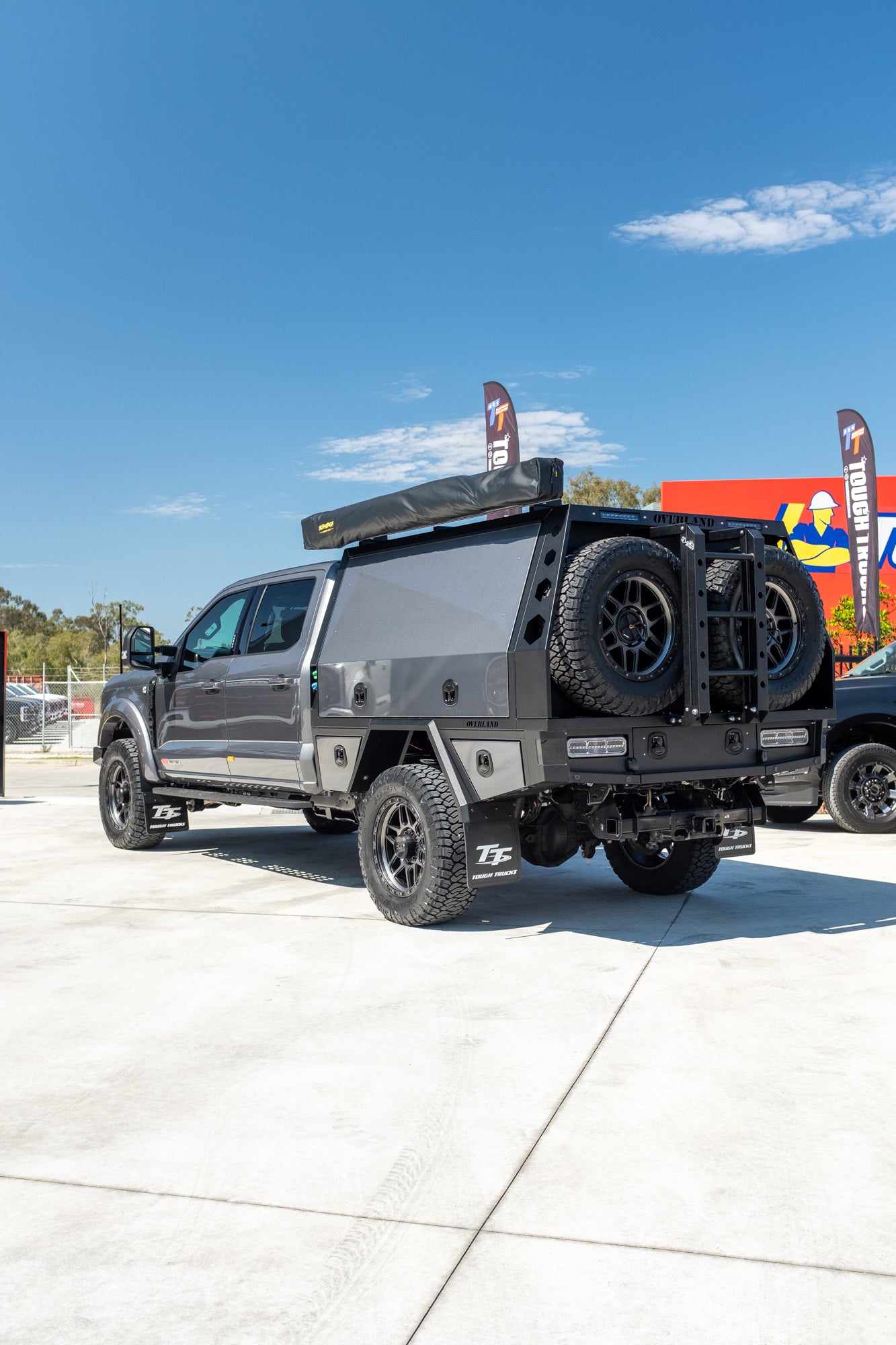 NEW 2023 F350 XLT TREMOR "OVERLAND PACKAGE" FACTORY 6-SEATER, CARBONIZED GREY (STOCK #TT0093).