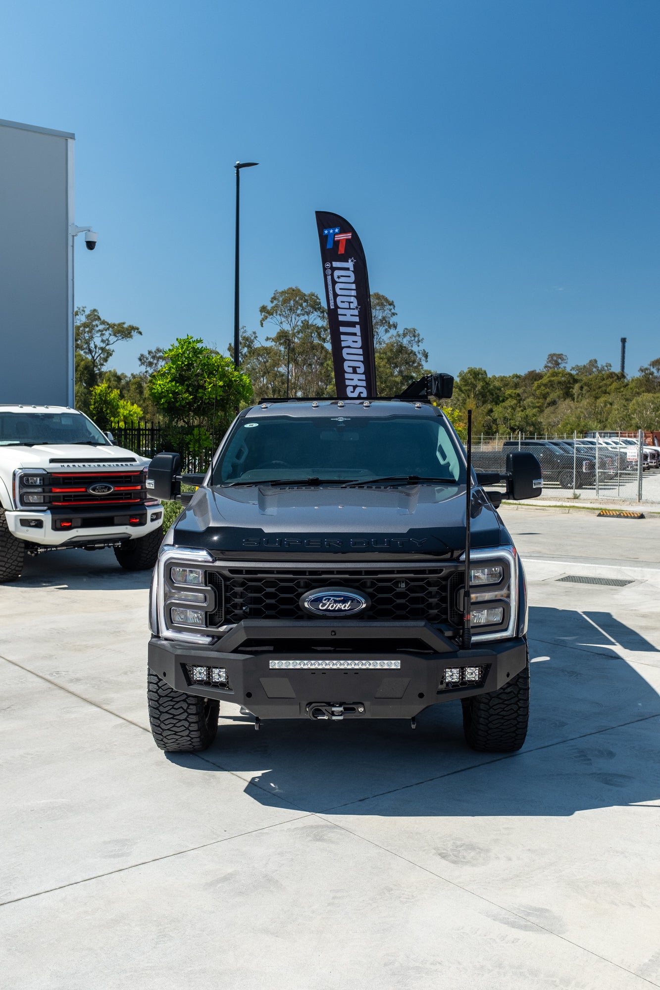 NEW 2023 F350 XLT TREMOR "OVERLAND PACKAGE" FACTORY 6-SEATER, CARBONIZED GREY (STOCK #TT0093).