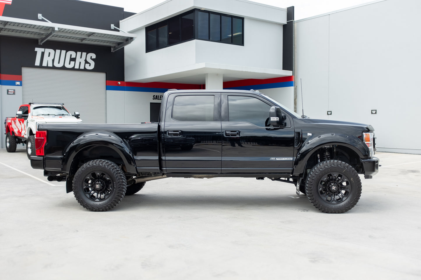 2022 FORD F250 LARIAT 'BLACK WIDOW' by SCA PERFORMANCE (STOCK #1002)