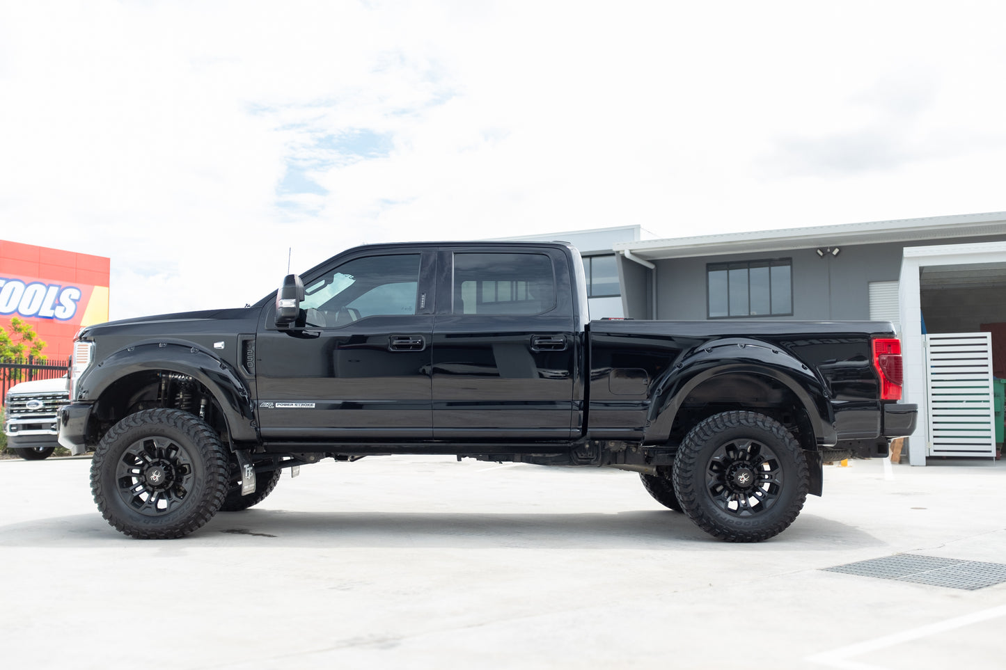 2022 FORD F250 LARIAT 'BLACK WIDOW' by SCA PERFORMANCE (STOCK #1002)