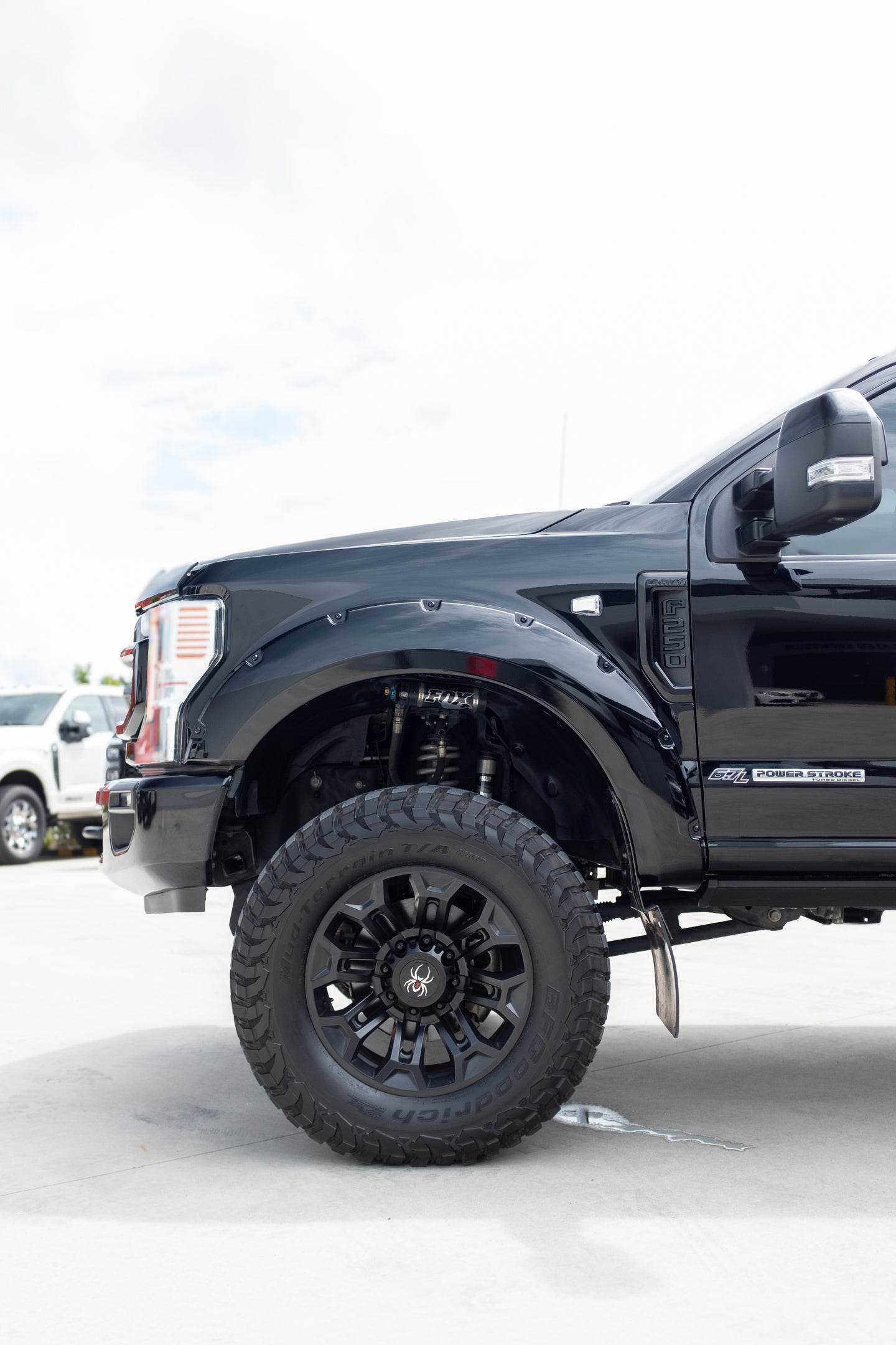 2022 FORD F250 LARIAT 'BLACK WIDOW' by SCA PERFORMANCE (STOCK #1002)