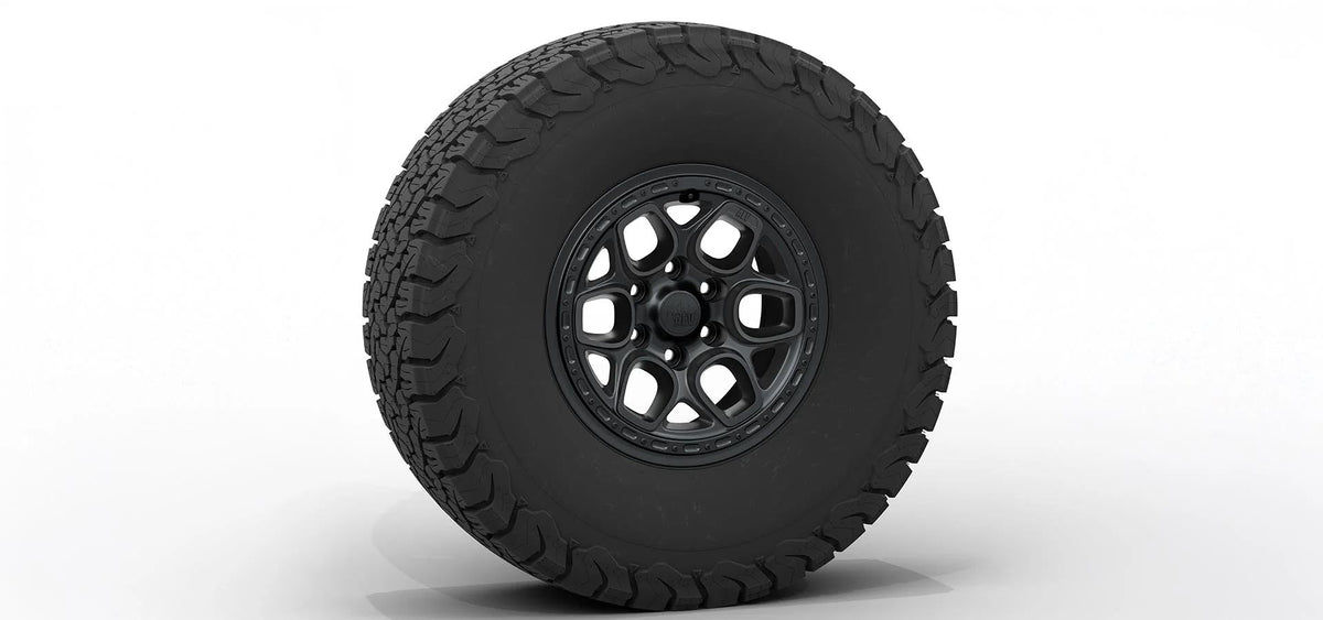 Black tire with a satin black rim on a white background | Satin Black Finish with Hardware Kit