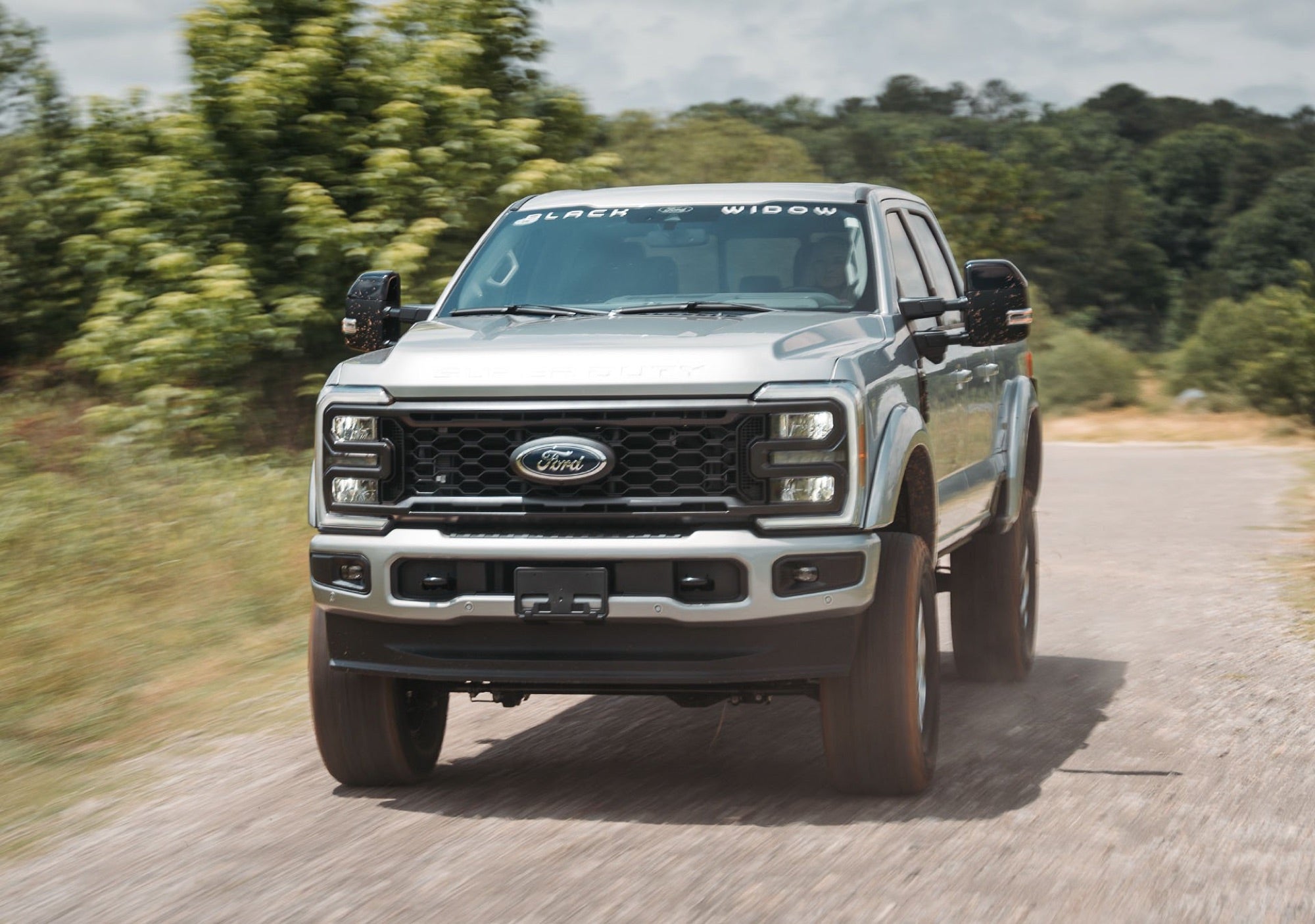 Ford Super Duty Black Widow in the dirt